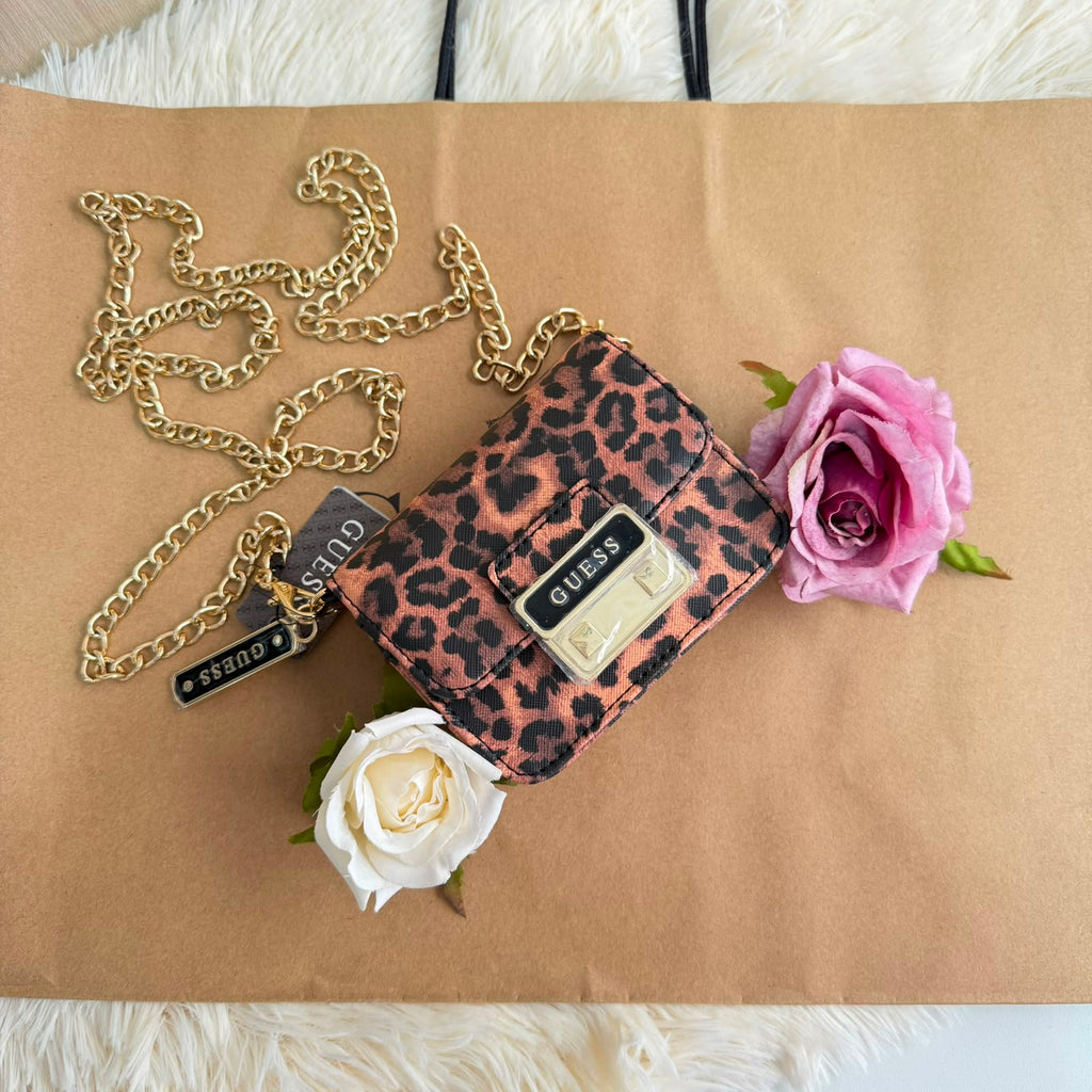 Bolsa mini tipo crossbody Guess