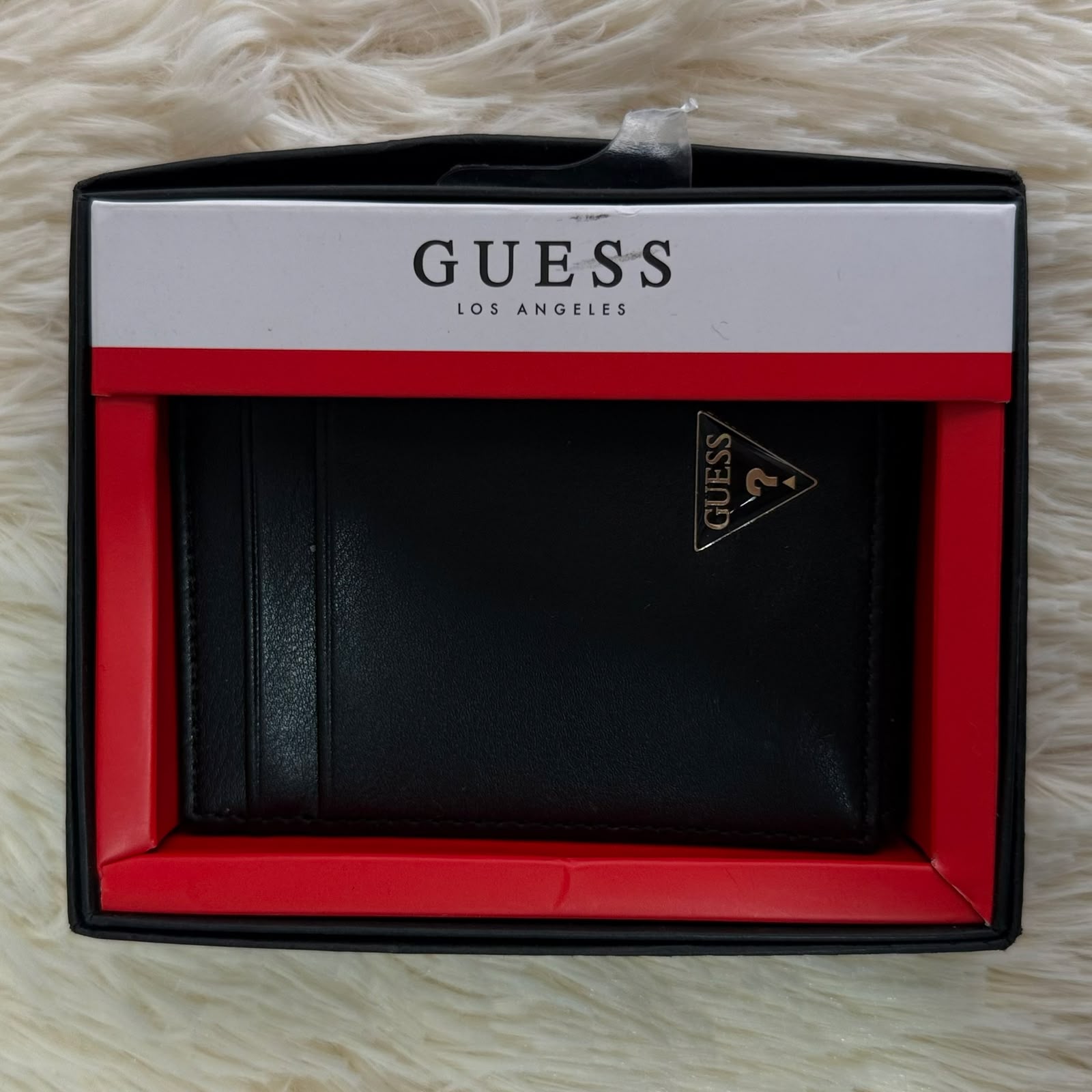 Tarjetero o billetera de caballero de la marca Guess